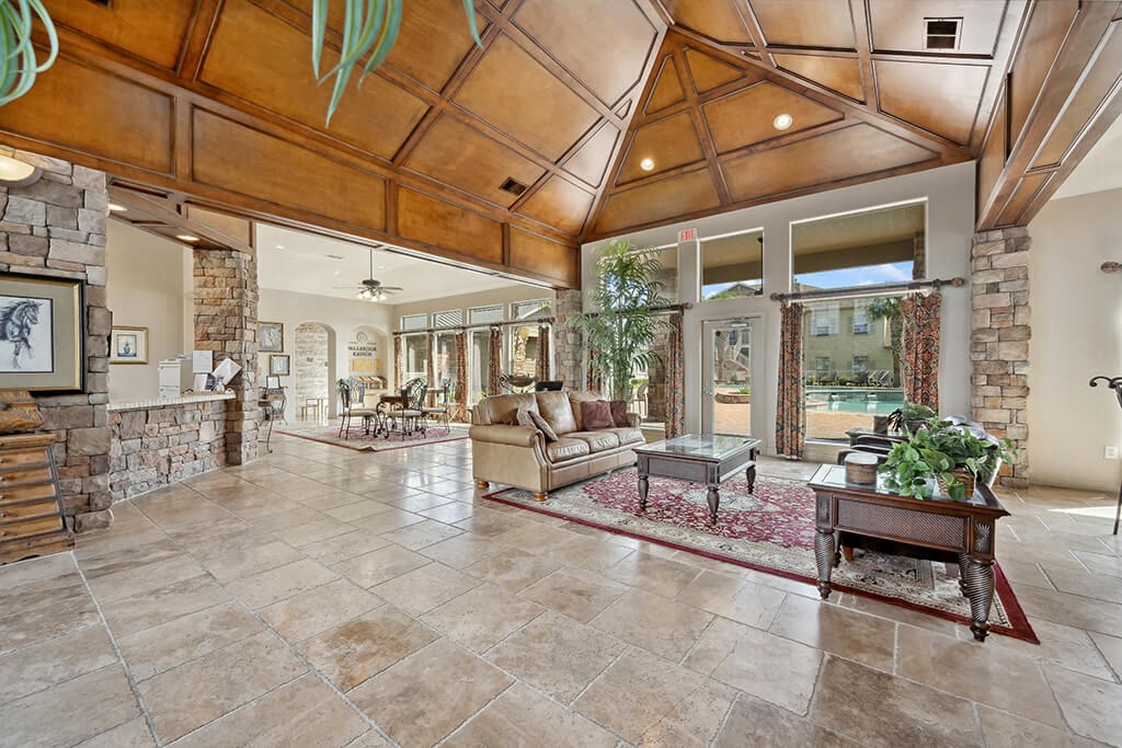 Large community room with seating at Fallbrook Ranch in Houston TX