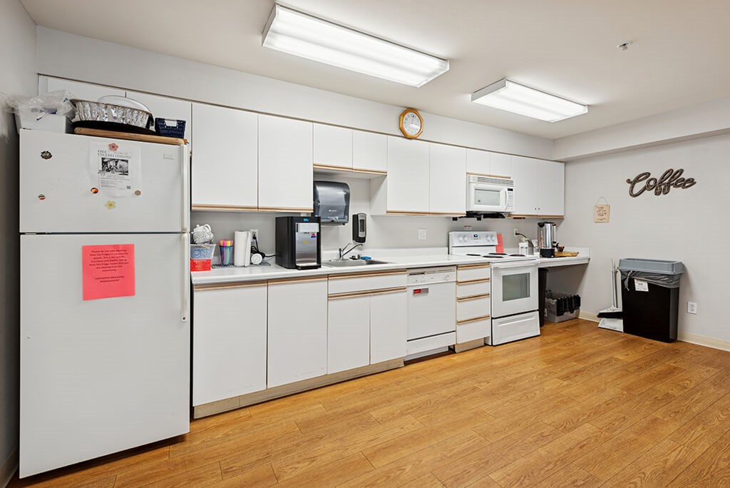 Community room kitchen at Lakewood Meadows Apartments in Lakewood WA