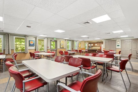 Community lounge and kitchen at Fairbrooke Senior Apartments in Aberdeen MD