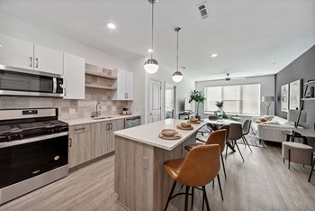 Cool Gloss Design Package Kitchen and Living Room at The Quill Apartments in Milford, MA - Photo Gallery 2