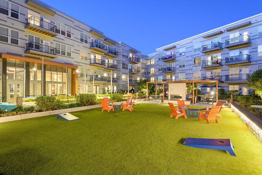 Cornhole and Lawn Chairs in Courtyard at Vero Apartments in Chelsea MA