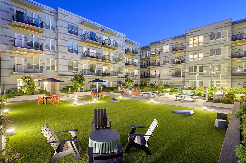 Courtyard Lawn at Dusk at Vero Apartments in Chelsea MA