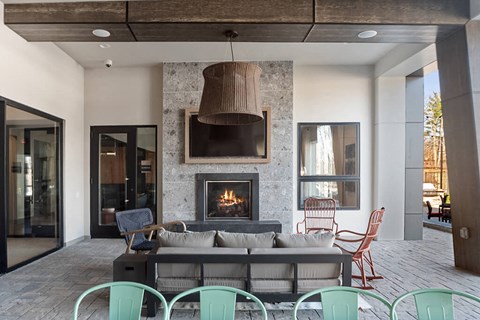 Courtyard Seating and Fireplace at The Quill Apartments in Milford, MA