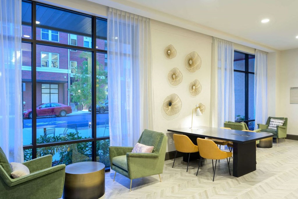 Coworking Lounge with seating areas at the Moxley in Fairfax VA