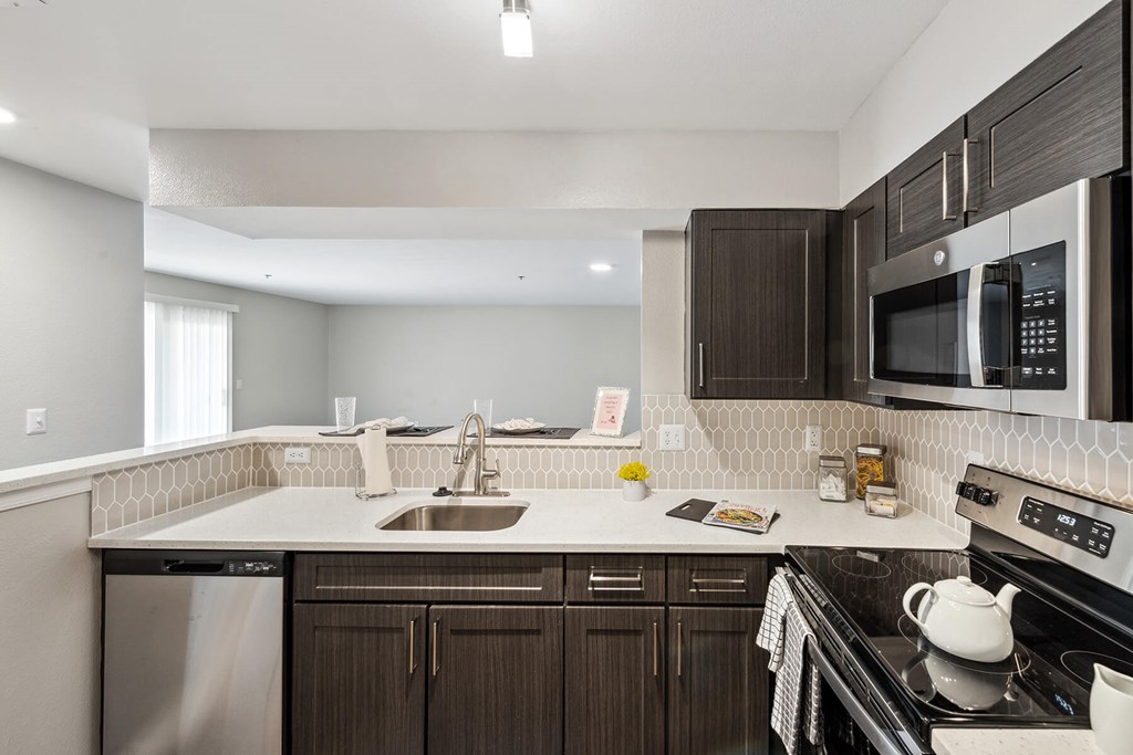 Kitchen with dark cabinets at England Run North in Fredericksburg VA