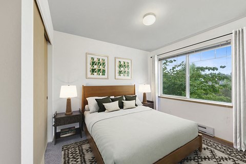Staged bedroom at Lakewood Meadows Apartments in Lakewood WA