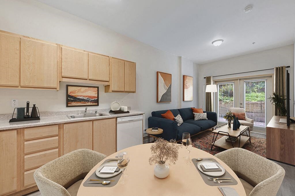 Digitally Staged Dining Area, Kitchen and living Room at Cedar Park Apartments in Seattle WA