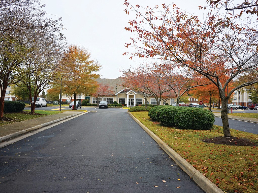 Driveway entrance at Whispering Oaks Apartments in Portsmouth VA