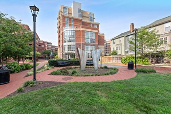 Green courtyard at Bradley Braddock Road Station Apartments in Alexandria VA - Photo Gallery 28