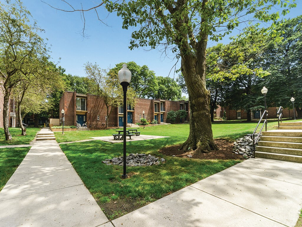 Grassy courtyard and walkway at University Heights in Providence RI