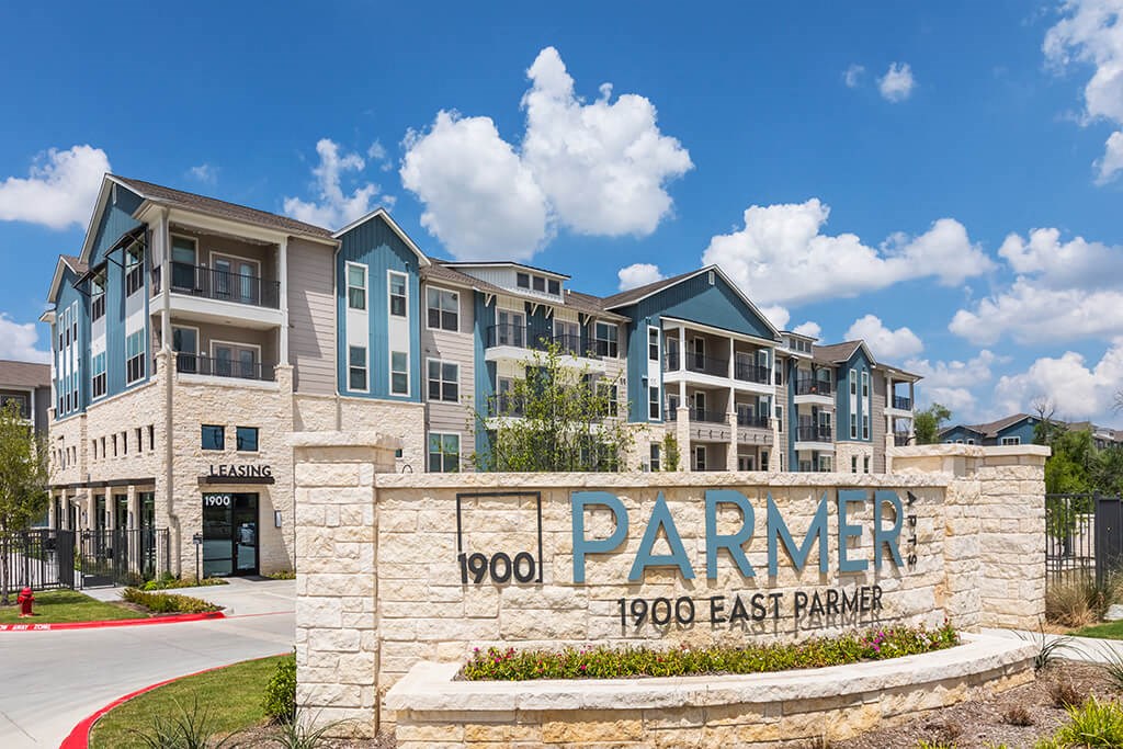 Exterior monument sign at 1900 Parmer Apartments in Austin TX