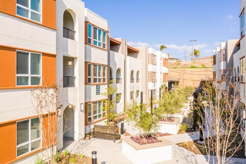 Exterior Building and Courtyard at The Seaton Apartments in San Diego CA