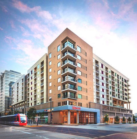 Exterior Building at Dusk at 1810 Main Apartments in Houston TX