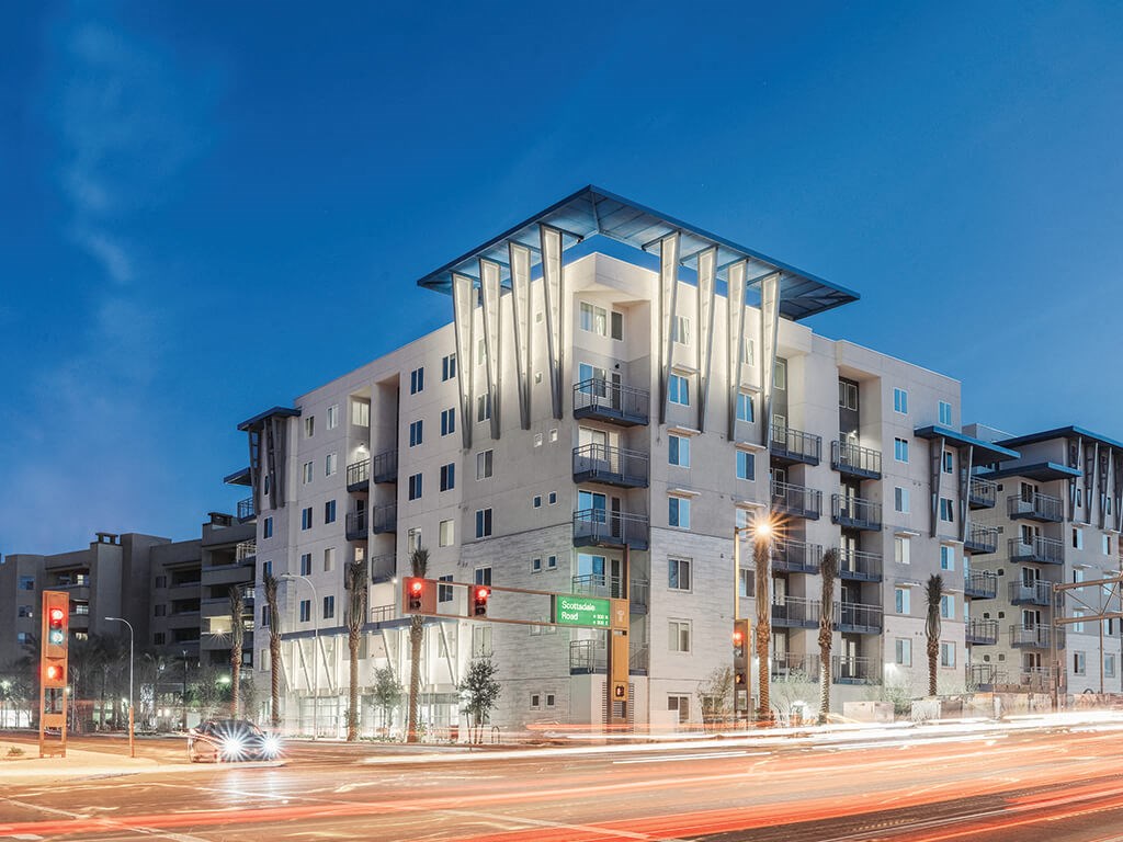 Exterior building at night at Norte Town Lake Apartments in Tempe Arizona