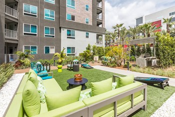 Exterior Courtyard Synergy Game Lawn at Aura Apartment Homes in Orange CA - Photo Gallery 31