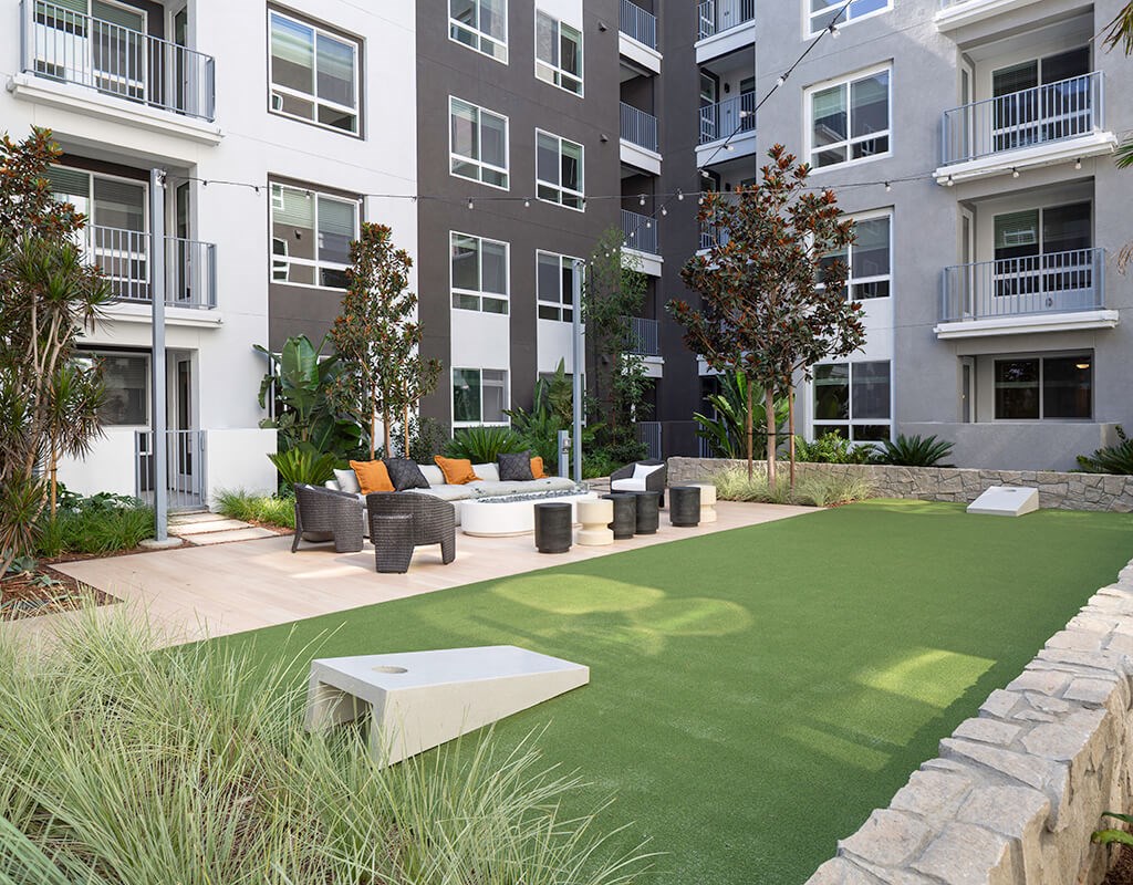 Exterior Courtyard The Patio Game Area at The Wylden Apartments in Los Angeles CA