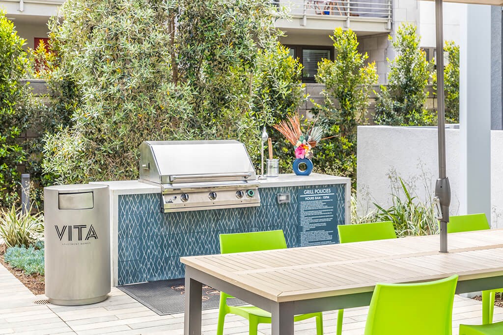 Exterior Courtyard Varsity Grill at Vita Apartment Homes in Orange CA