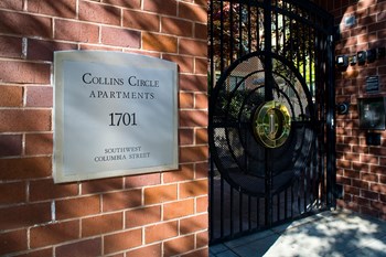 Exterior Gated Entry at Collins Circle Apartments in Portland OR - Photo Gallery 9