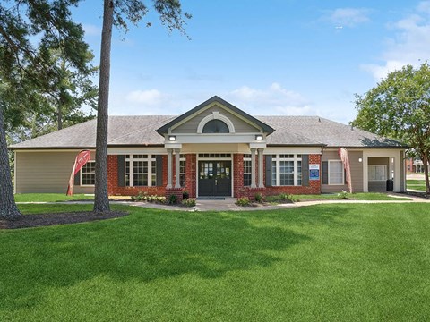 Exterior leasing office at Park Village Apartments in Conroe TX