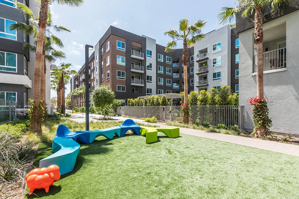 Exterior Paseo Life and Energy Seating Close Up at Vita Apartment Homes in Orange CA