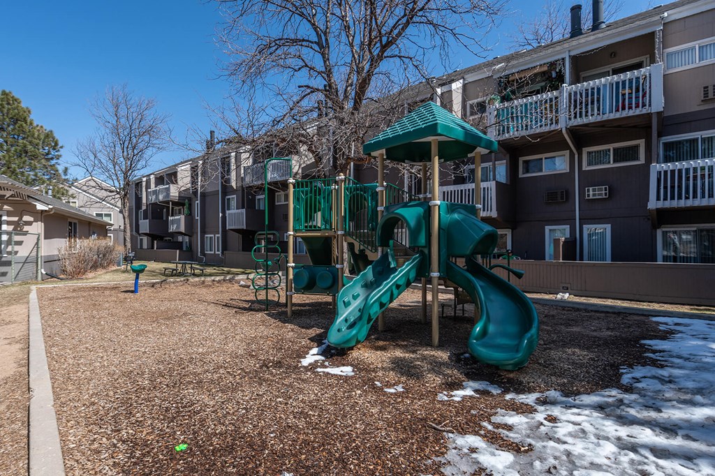 Exterior Playground at The Pine Apartments in Lakewood CO