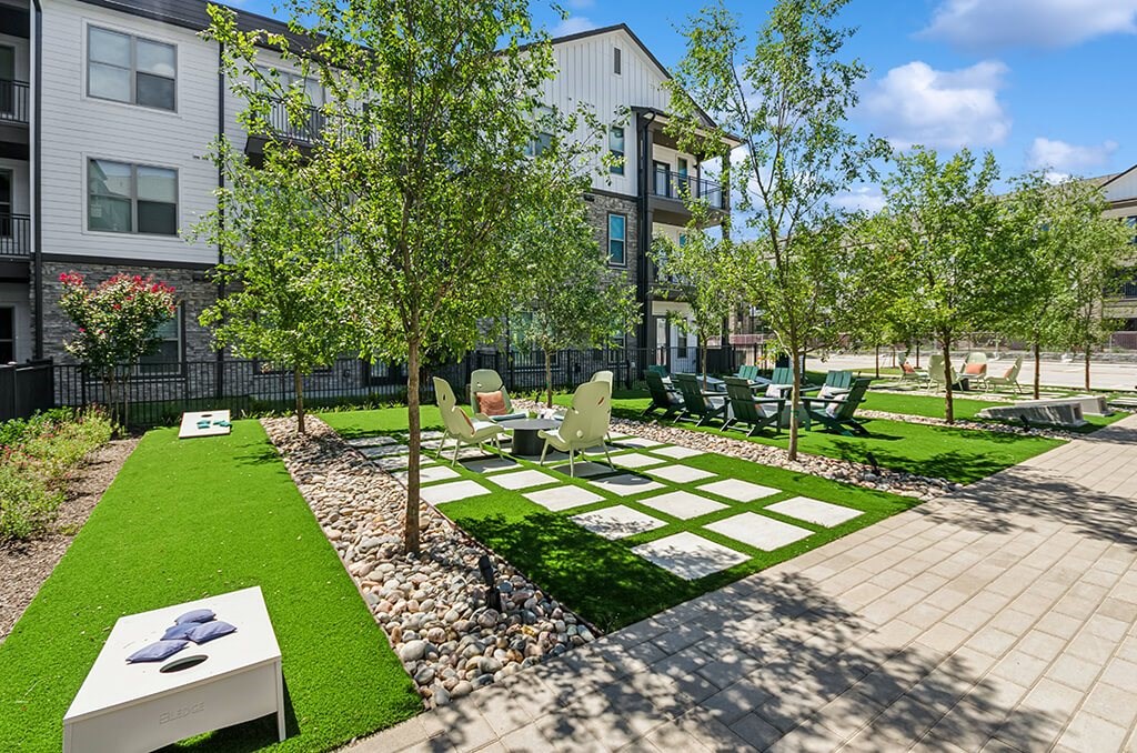 Exterior The Grill Courtyard Game Area at The Waylon Apartments and Townhomes in McKinney TX