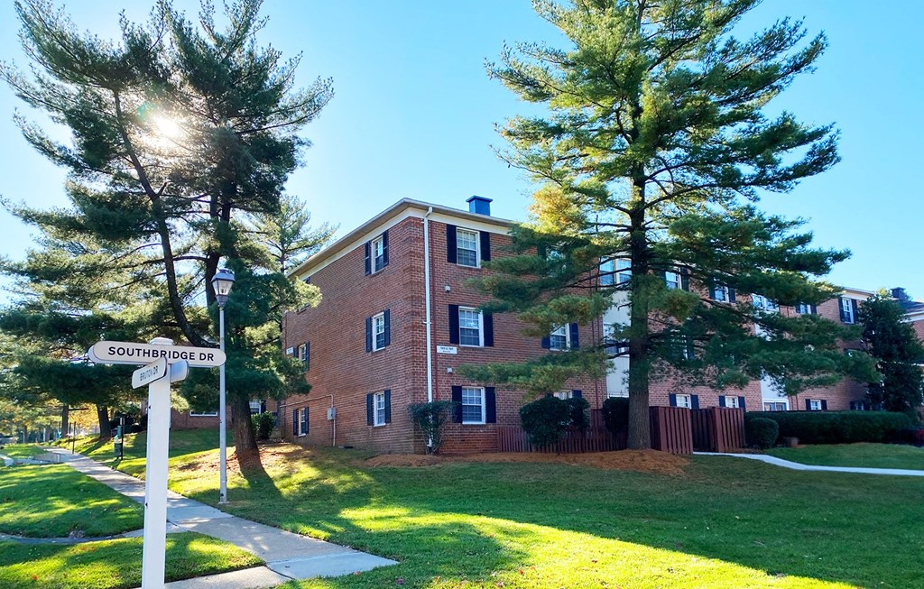 Exterior building with lush landscaping at Villages at Marley Station in Glen Burnie MD