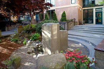Exterior Water Feature at Collins Circle Apartments in Portland OR - Photo Gallery 8