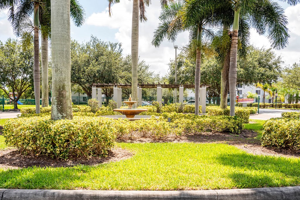 Exterior fountain at Cedar Grove Apartments in Miami Gardens FL