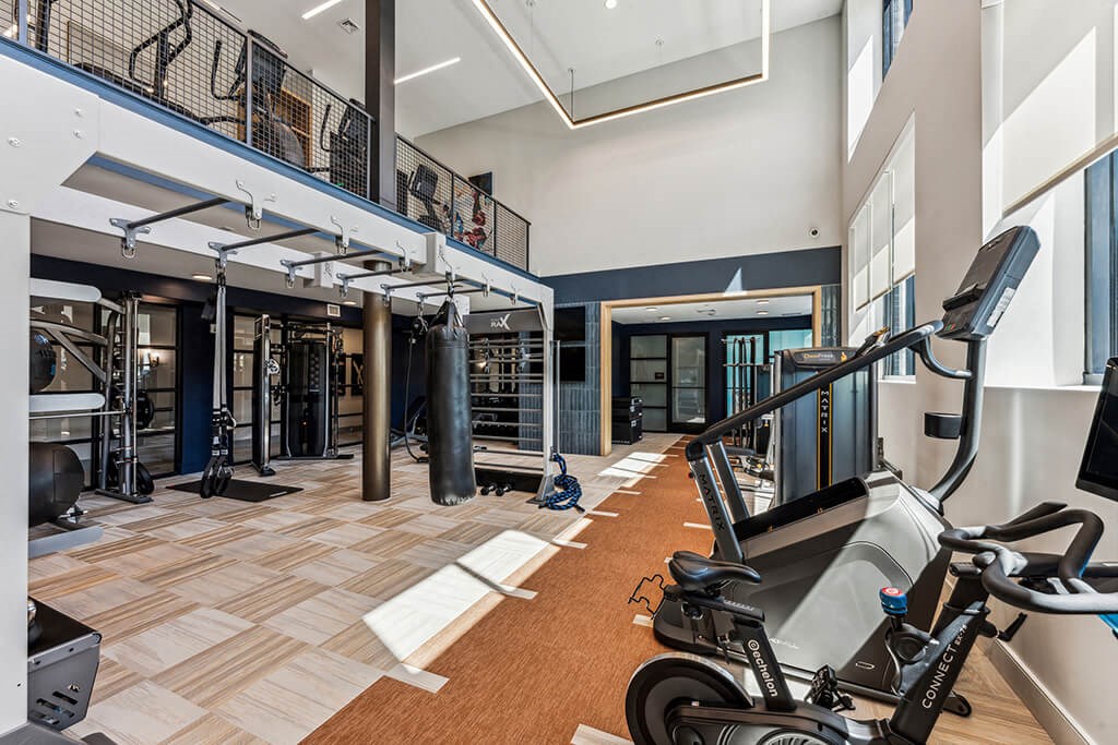 Fitness center with two stories at 333 Ellington Apartments in Gaithersburg MD