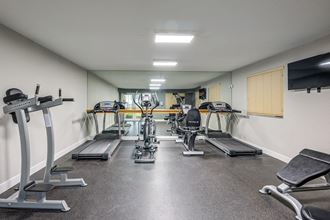Fitness Center cardio machines at Emerald Dunes Apartments in Miami Gardens FL - Photo Gallery