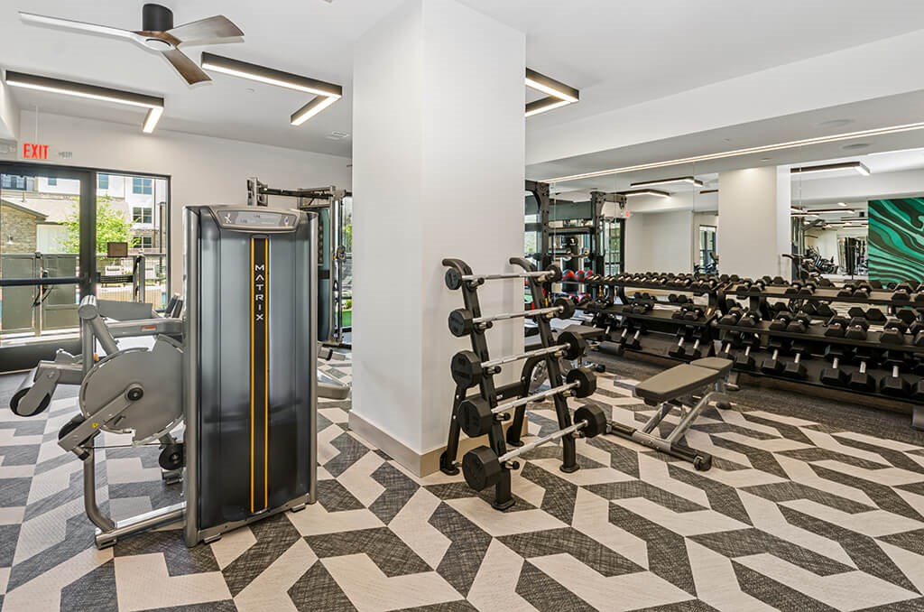 Fitness Center Free Weights at The Waylon Apartments and Townhomes in McKinney TX