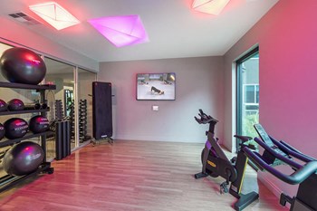Fitness Center Studio Balance at Aura Apartment Homes in Orange CA - Photo Gallery 24