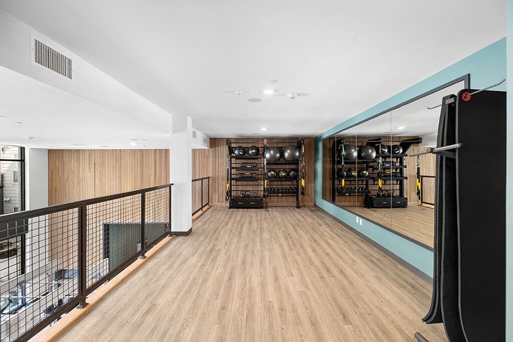 Fitness center upper level at East Bend Apartments in Houston TX