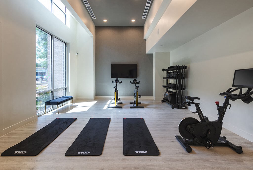 Fitness Center Yoga and Spin Room at 1810 Main Apartments in Houston TX