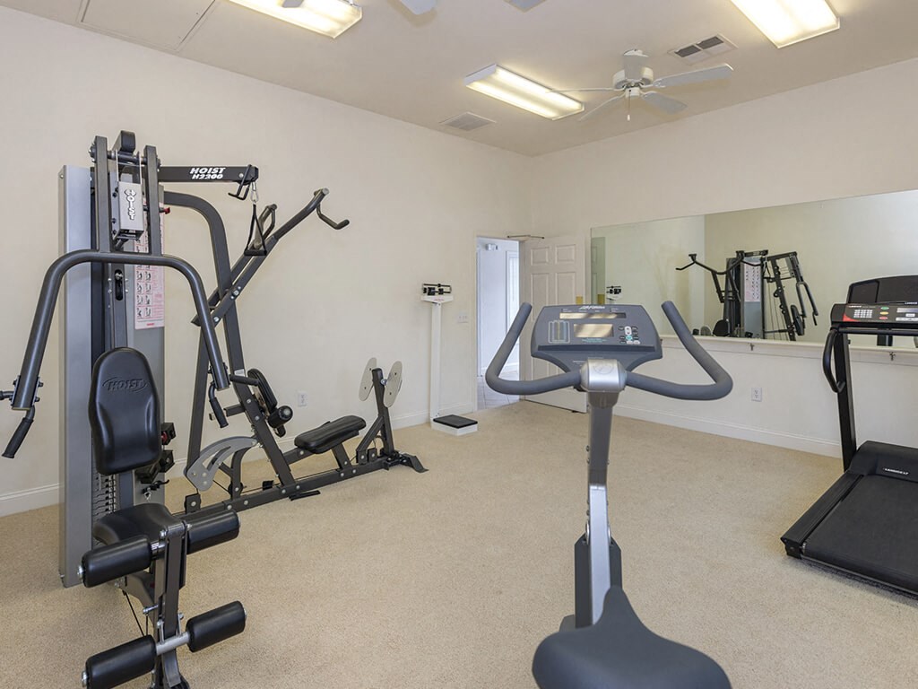 Fitness center at Whispering Oaks Apartments in Portsmouth VA
