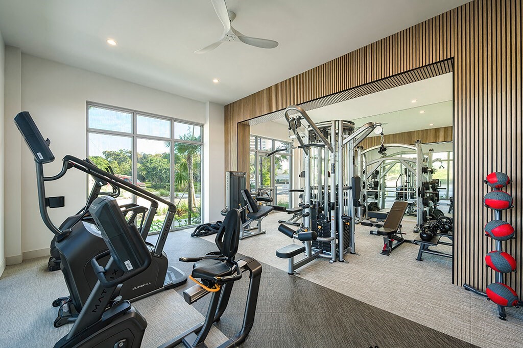 Fitness center with equipment at Treo Apartments in Fort Lauderdale FL