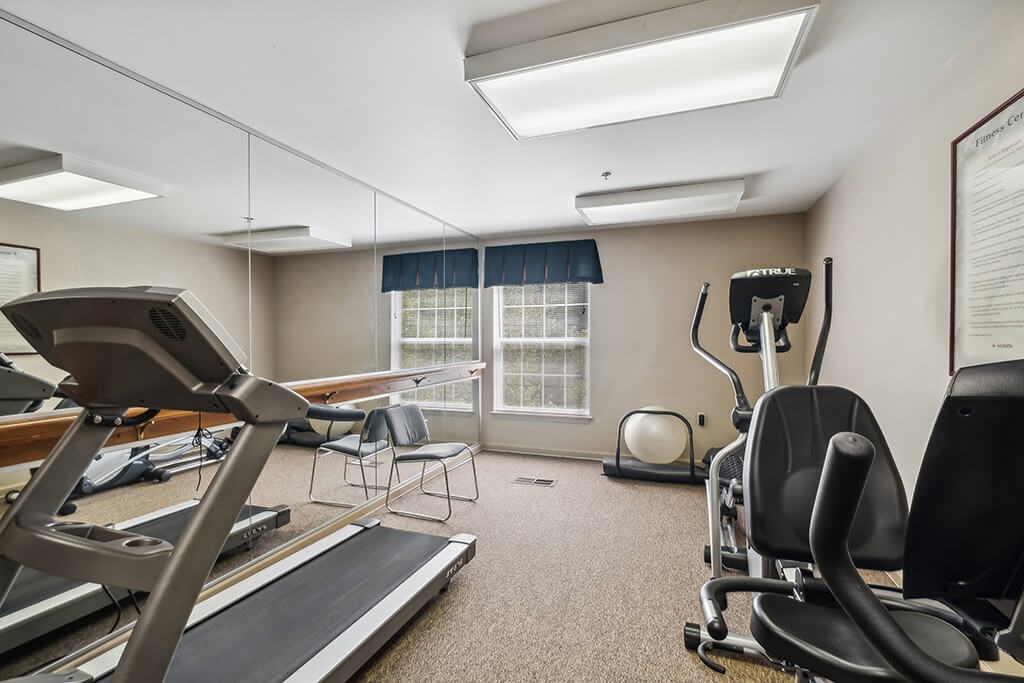 Fitness center at The Woods at Victoria Park Apartments in Woodbridge VA