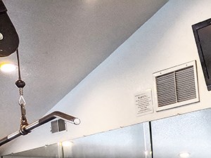 Floor-to-ceiling mirrors in fitness center Fitness center at Westbrook apartments in San Diego CA