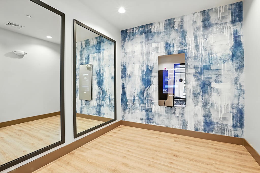 Fitness center e trainer at Station 316 Apartments in Woburn MA