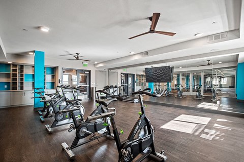 Fitness center spin room at District at Scottsdale Apartments in Scottsdale AZ