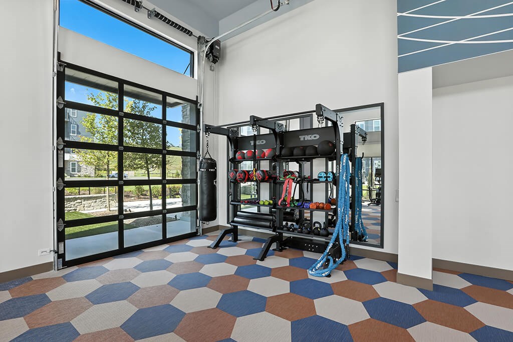 Fitness center weights at Station 316 Apartments in Woburn MA