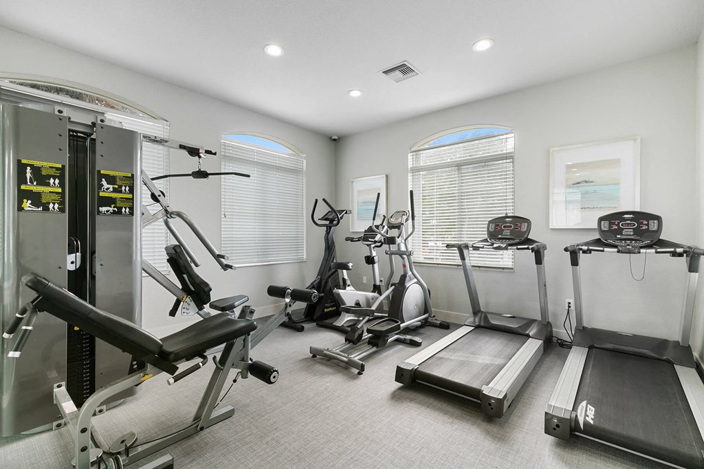 Fitness center treadmills at Brenton at Abbey Park Apartments in West Palm Beach FL
