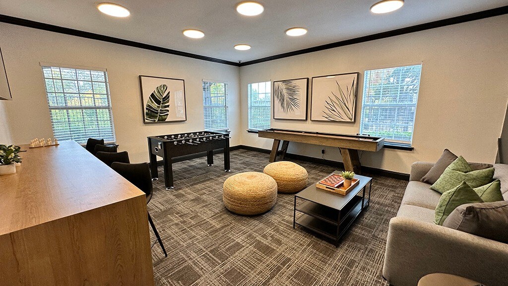 Game room with games at Cypress View Villas Apartments in Weatherford TX