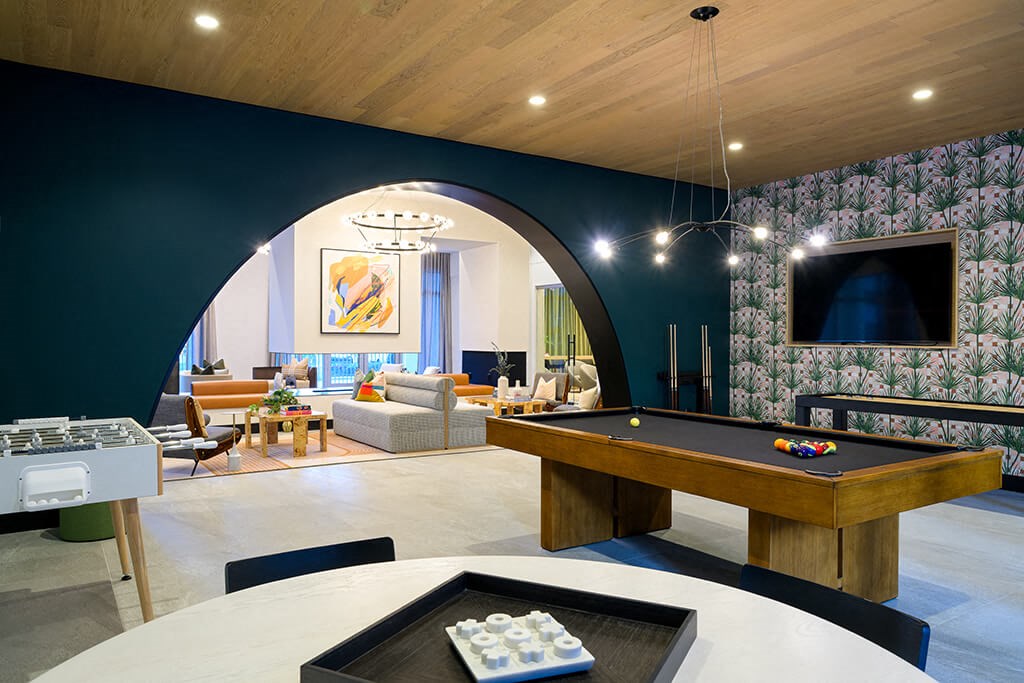 Game room and social lounge at Coasterra Apartments in Fort Lauderdale FL