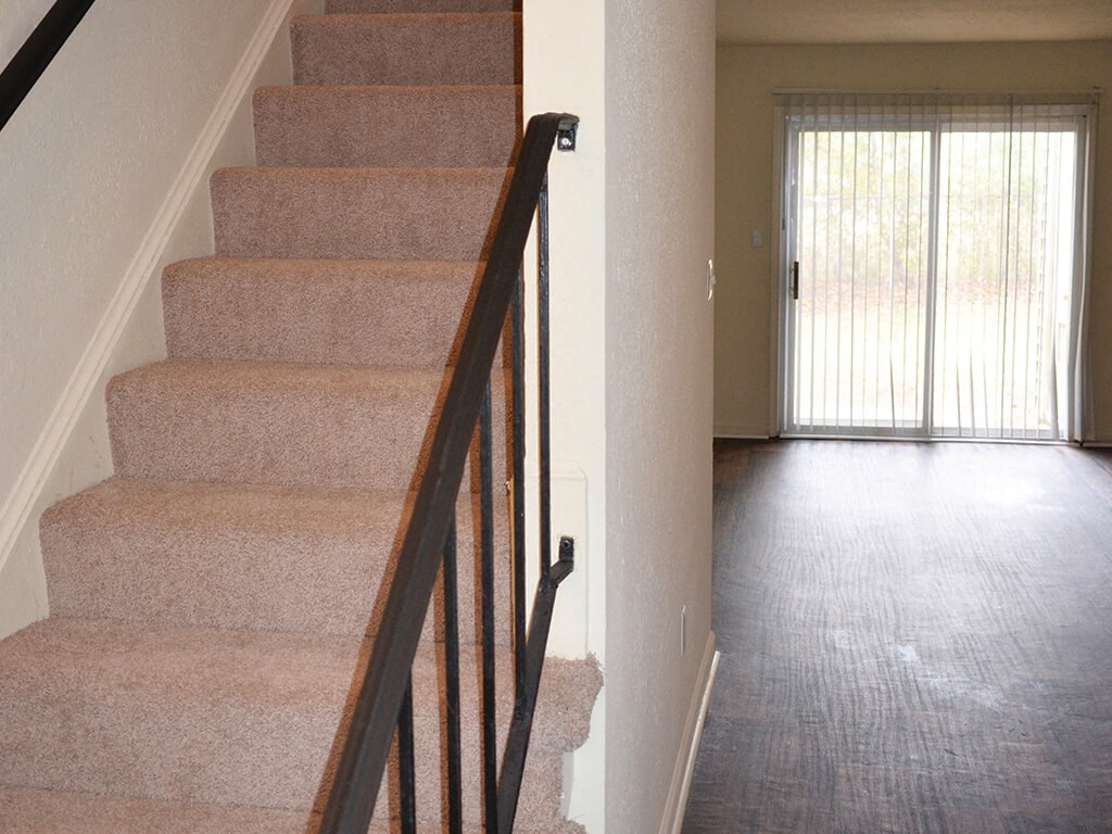 Townhome staircase at Whispering Oaks Apartments in Portsmouth VA