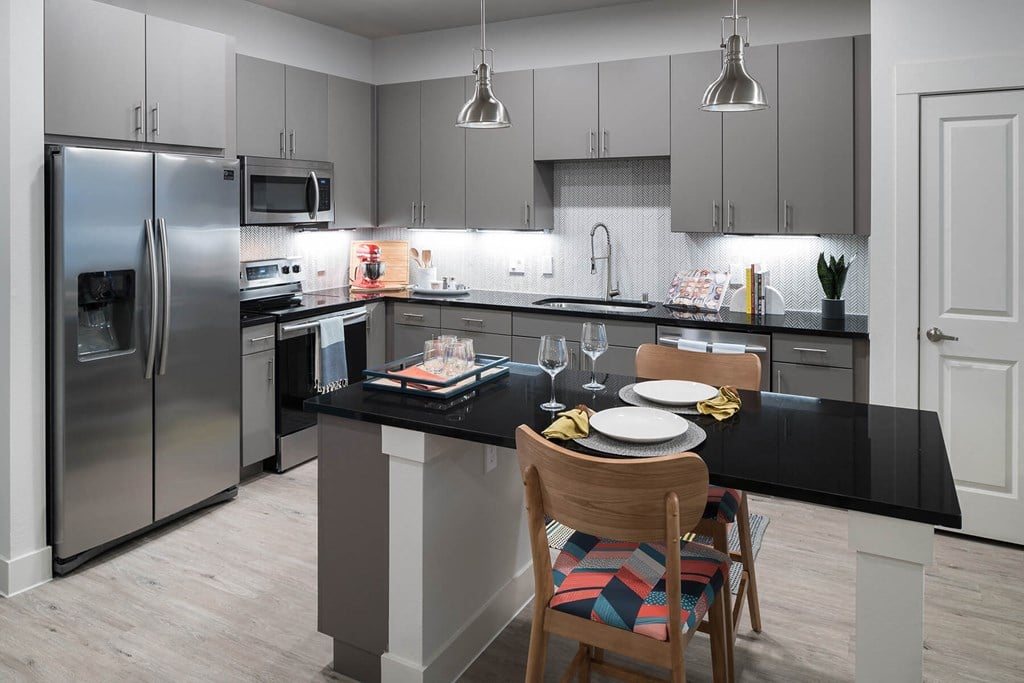 Kitchen island at Jada Legacy Central Apartments in Plano TX