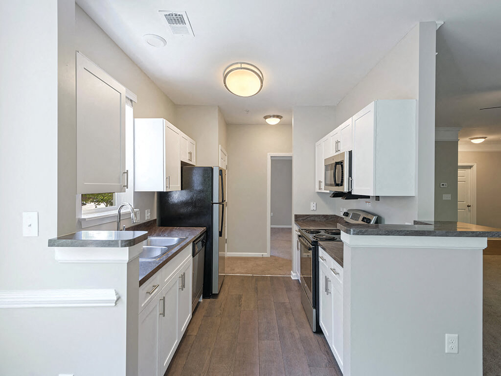 Kitchen walkway at Falls Pointe Apartments in Durham NC
