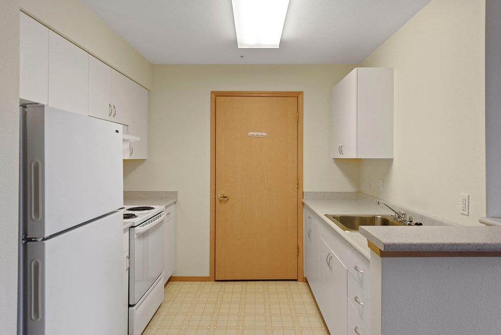 Kitchen with light at Alderwood Court in Lynnwood WA