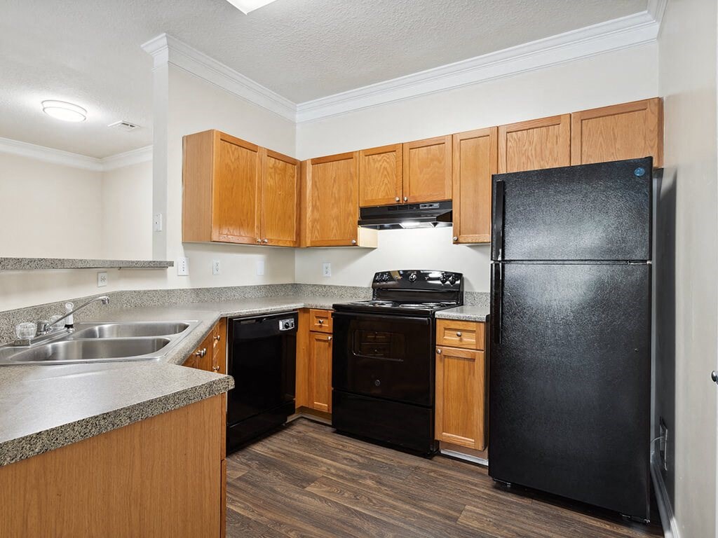 Kitchen with black appliances at Lakeside VIsta in Kennesaw GA